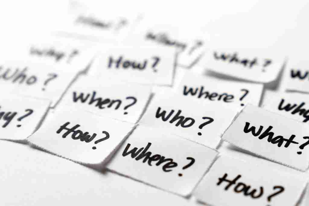 Small paper cuts with written questions on each of it.