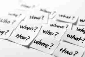 Small paper cuts with written questions on each of it.